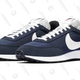 Nike Navy Air Tailwind 79, $90